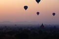 Balloons across the Bagan in sunrise